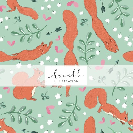A seamless pattern tile with a light green background and red squirrels. Features hearts, baby's breath, leaves, clover and arrows in the gaps between the squirrels.